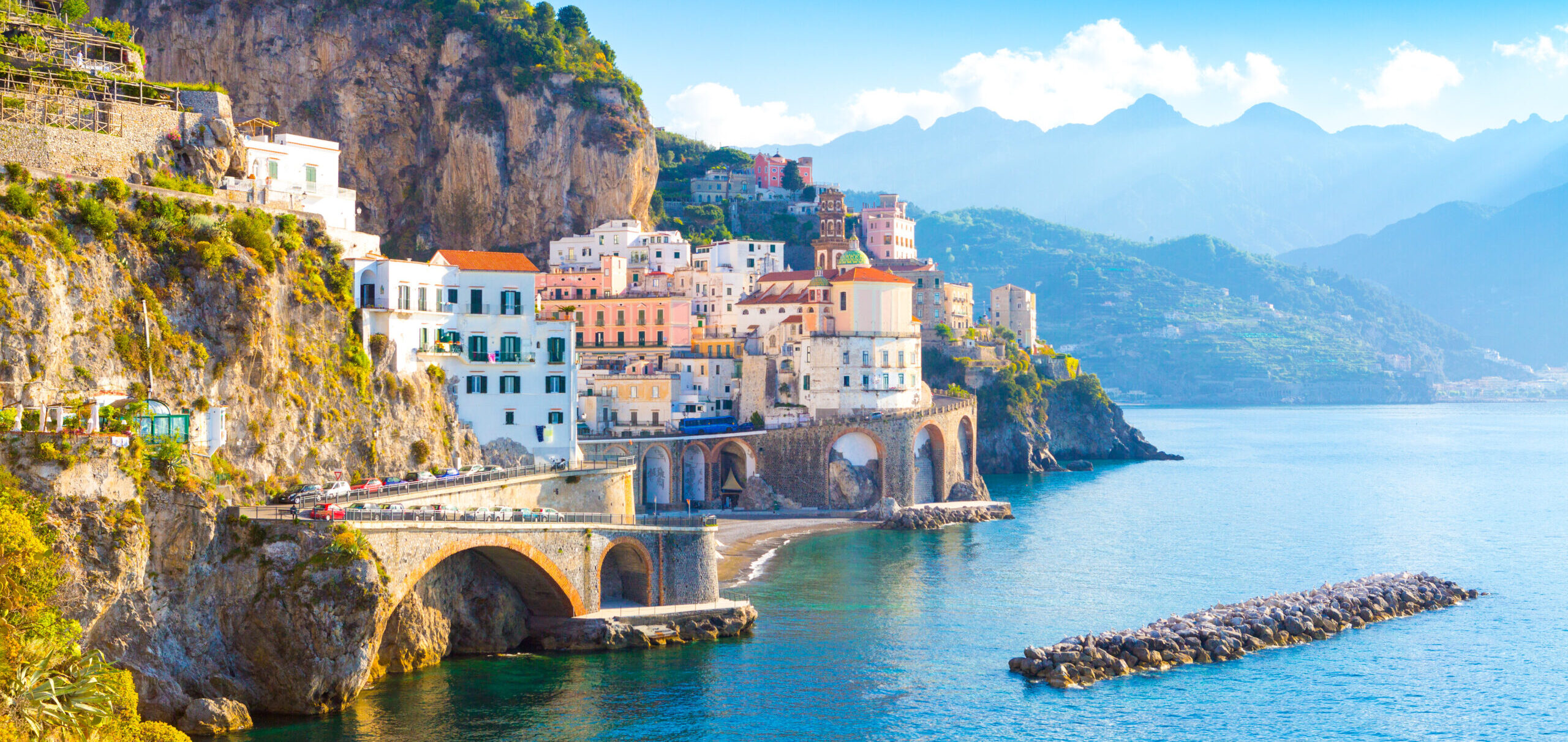Morning view of Amalfi cityscape on coast line of mediterranean sea, Italy
