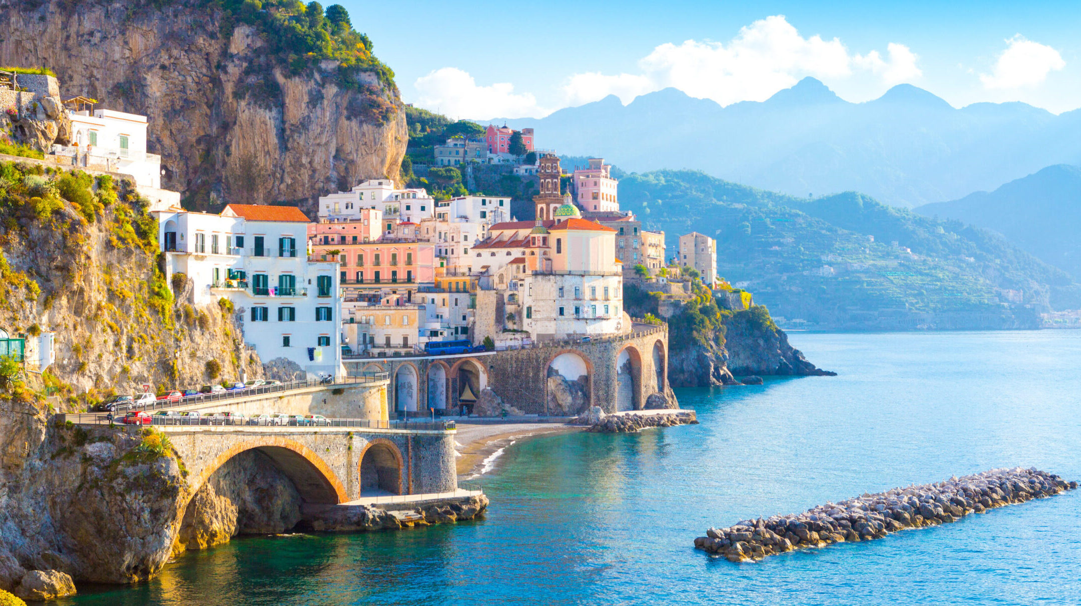 Morning view of Amalfi cityscape on coast line of mediterranean sea, Italy